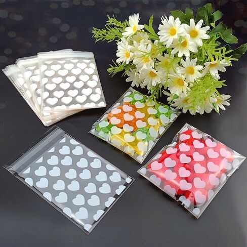 FAZHBARY 100 PCS Small Clear Cellophane Treat Bags With White Heart Candy Goodies Bags Self Sealing Bags for Packing Supplies in Saudi Arabia