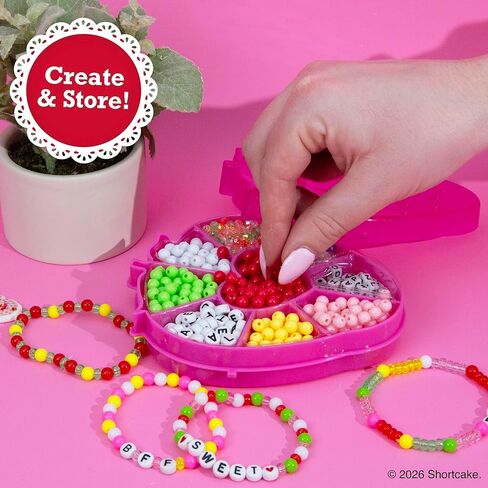 مجوهرات قوس قزح Strawberry Shortcake™، مجموعة أساور الصداقة التي يمكنك صنعها بنفسك، ابتكر أكثر من 15 إكسسوارًا، تتضمن خرزًا، وحلي معدنية، وسلكًا، وعلبة خرز على شكل فراولة in Kuwait