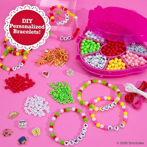 مجوهرات قوس قزح Strawberry Shortcake™، مجموعة أساور الصداقة التي يمكنك صنعها بنفسك، ابتكر أكثر من 15 إكسسوارًا، تتضمن خرزًا، وحلي معدنية، وسلكًا، وعلبة خرز على شكل فراولة in Kuwait
