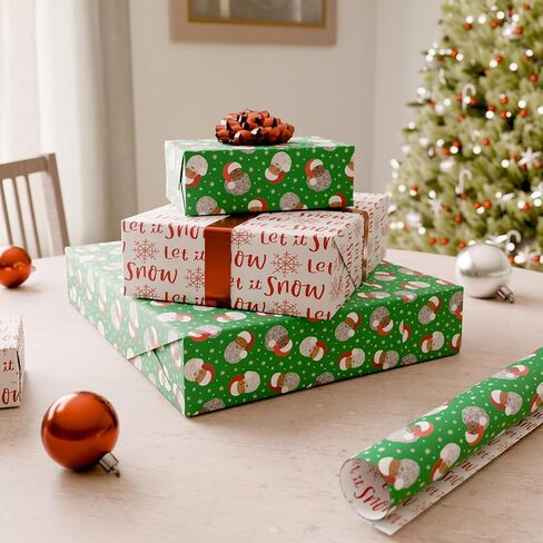 American Greetings Reversible African American Santa Christmas Wrapping Paper Roll, Red, White and Green Holiday Gift Wrap (60 sq. ft., 1 Standard Roll Wrap-30 in. x 24 ft.) Stripes and Solid Green in Saudi Arabia