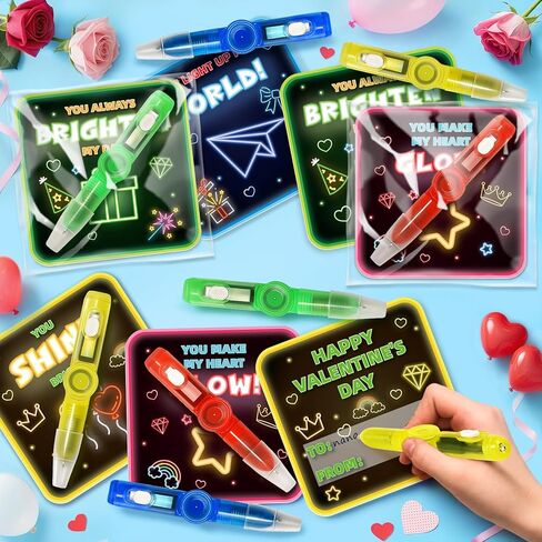Duchong Valentines Day Cards for Kids School, 28 Packs Spin Glow Pen Toys with Greeting Cards, Valentine Kids Party Favor, Classroom Exchange Prizes, Ideal Valentines Rewards Gifts for Boys Girls in Saudi Arabia