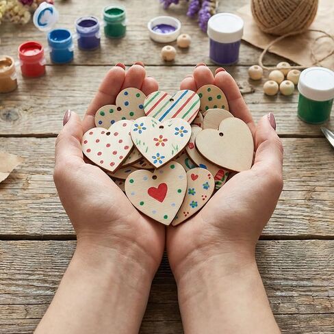 cobee 100PCS Wooden Hearts for Crafts, Wood Unfinished Hearts with Holes, 1.3in Wooden Unfinished Heart Decorations for DIY Valentine Arts Wedding Card Making Crafts Decoration in Saudi Arabia
