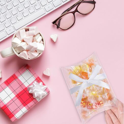 Klmnop 70 PCS 5.51 x 3.54x 1.18 Inch Clear Pillow Gift Boxes, Plastic Candy Treat Favor Box with Ribbon, Sweet Bags for Wedding Birthday Party Gift Packing Supplies(Clear) in Saudi Arabia
