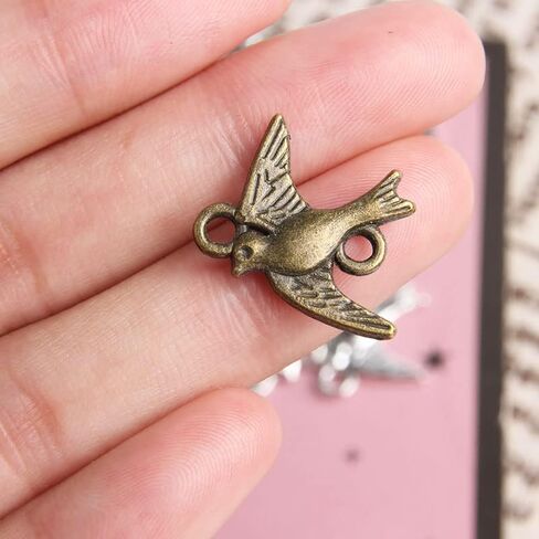 Opexicos 100Pcs Antique Silver Swallow Bird Charm Connector Bracelet Necklace Jewelry Making Handmade DIY in Saudi Arabia