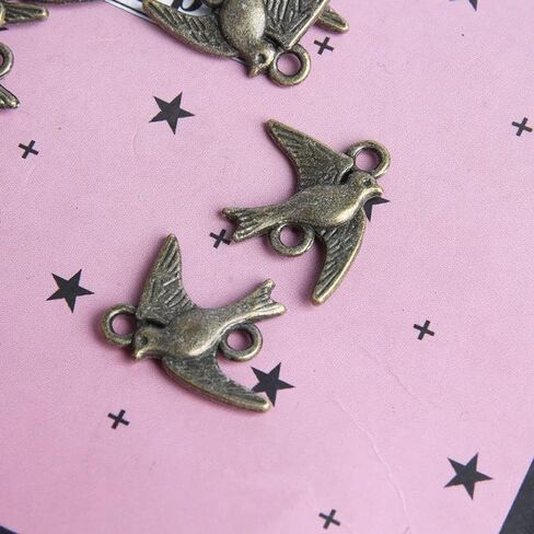 Opexicos 100Pcs Antique Silver Swallow Bird Charm Connector Bracelet Necklace Jewelry Making Handmade DIY in Saudi Arabia
