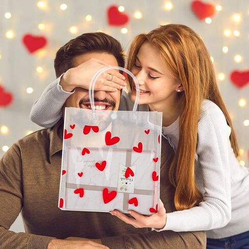 Roowest 50 Pcs Valentine Heart Clear Gift Bag with Handle 8 x 8 x 3.15 Inch Transparent PVC Wrap Bags with Button Reusable Plastic Retail Shopping Bags for Valentine Gift Wedding Party Favor in Saudi Arabia
