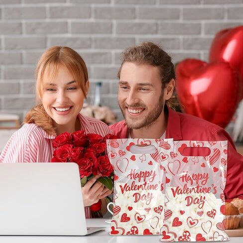 Whaline 50Pcs Valentine's Day Party Favor Bag Plastic Treat Bags with Handles Red Heart Clear Candy Goodie Bags for Wedding Anniversary Snack Cookie Packing in Saudi Arabia