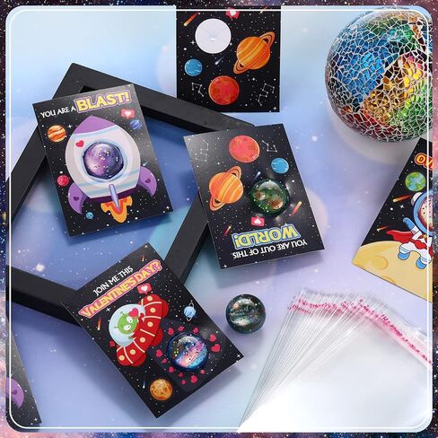 Hungdao 28 Pcs Valentine's Day Gift Card with Space Bouncy Balls Bulk Valentine's Greeting Cards Bouncing Ball Favors for Valentine School Classroom Exchange Gift in Saudi Arabia
