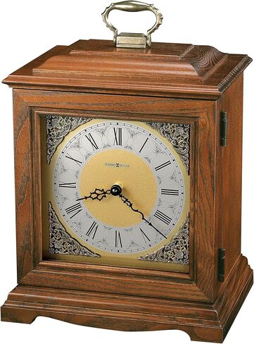 Howard Miller Continuum Mantel Clock Urn Box 800-120 - لمسة نهائية من خشب البلوط يوركشاير، اختر الأخشاب الصلبة والقشرة، ساعة أرقام رومانية على شكل قوس، مقصورة داخلية، صندوق جرة الجنازة in Saudi Arabia