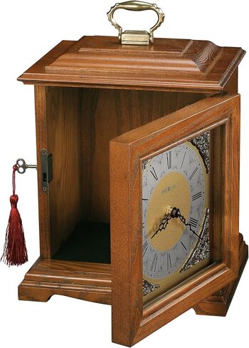 Howard Miller Continuum Mantel Clock Urn Box 800-120 - لمسة نهائية من خشب البلوط يوركشاير، اختر الأخشاب الصلبة والقشرة، ساعة أرقام رومانية على شكل قوس، مقصورة داخلية، صندوق جرة الجنازة in Saudi Arabia