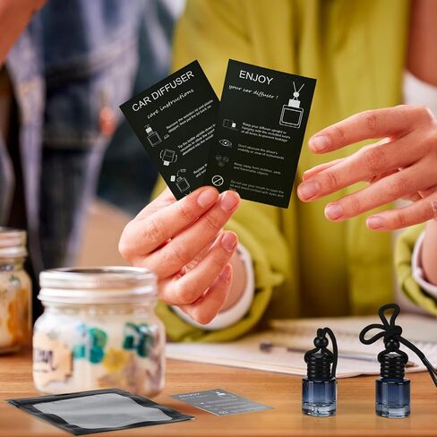 Boao 50 Sets Hanging Car Air Freshener Diffuser Bottles with Instruction Card and 4 x 6'' Resealable Holographic Bag for Empty Car Essential Oil Perfume Bottles Packaging (Cylinder,Black) in Saudi Arabia