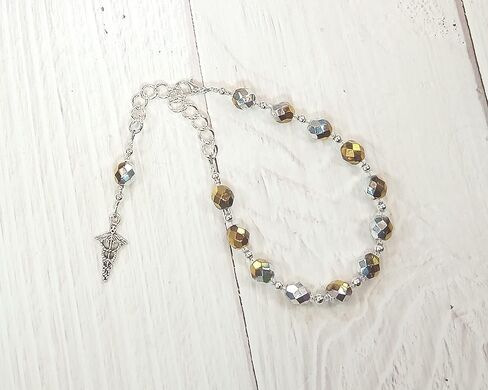 Prayer Bead Bracelet with Caduceus for the Greek God of Communication, Commerce, Competition, Diplomacy, Rhetoric, Travel, Cleverness in Saudi Arabia