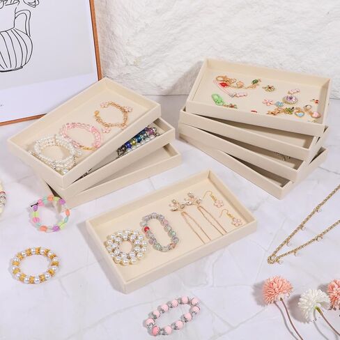 12 قطعة من صينية المجوهرات المخملية الصغيرة، أدراج المجوهرات القابلة للتكديس، صواني تنظيم المجوهرات، صواني عرض المجوهرات للقلادة، القرط، الخاتم، السوار، 8.3 × 4.8 × 1 بوصة (بيج) in Kuwait