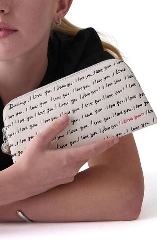 kate spade new york Devin I Love You Script Embossed Leather Pouch in Saudi Arabia