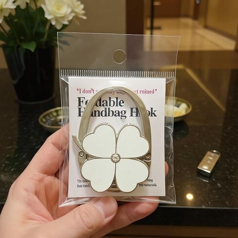 Foldable Purse Hanger with Four-Leaf Clover Design, Portable Handbag Hook for Tables and Counters in Saudi Arabia