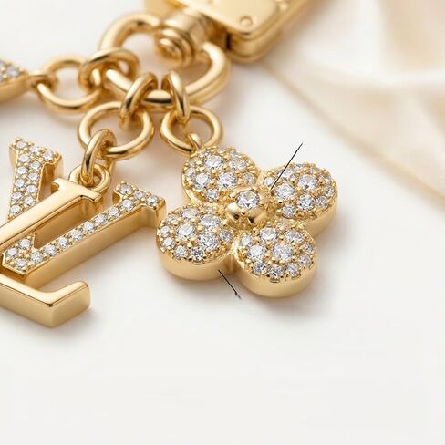 سلسلة مفاتيح كريستالية مطلية بالذهب - قلادة زهرية وقلادة أولية للمحفظة وحقيبة الظهر in Kuwait