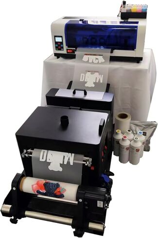 طابعة XP600 DTF مزودة بآلة مجفف اهتزاز، مستقرة وملونة، وتتضمن حبرًا وفيلمًا ومسحوقًا بحجم 5 × 500 مل in Kuwait