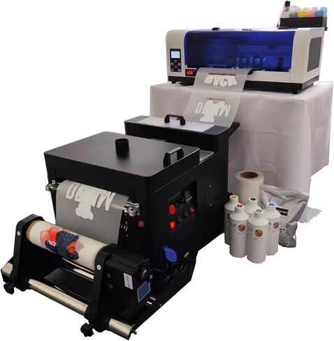 طابعة XP600 DTF مزودة بآلة مجفف اهتزاز، مستقرة وملونة، وتتضمن حبرًا وفيلمًا ومسحوقًا بحجم 5 × 500 مل in Kuwait