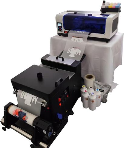 طابعة XP600 DTF مزودة بآلة مجفف اهتزاز، مستقرة وملونة، وتتضمن حبرًا وفيلمًا ومسحوقًا بحجم 5 × 500 مل in Kuwait