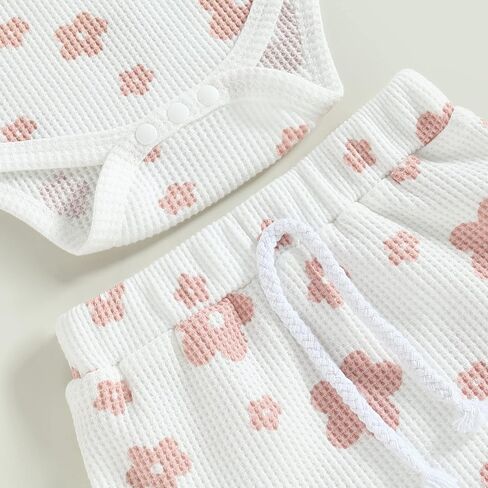 أطقم ملابس صيفية للفتيات الصغيرات، قطع علوية بدون أكمام وطبعات زهور، وشورتات مكشكشة مع عصابة رأس، ملابس قطنية in Kuwait