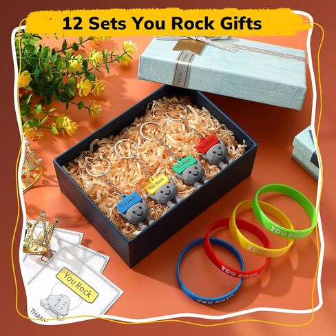 Gejoy 12 مجموعة من الهدايا الإيجابية التي تتضمن 12 سلسلة مفاتيح من التماثيل الصغيرة You Rock و12 سوارًا من السيليكون و12 بطاقة إيجابية و12 كيسًا من الهدايا المنمنمة التشجيعية الملهمة لفريق الموظفين في زملاء العمل in Kuwait