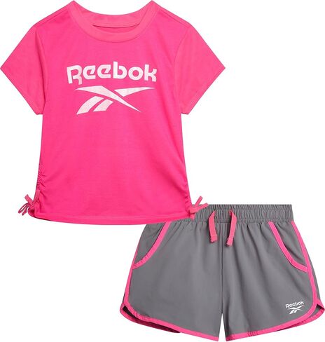 طقم شورت للفتيات من ريبوك - قطعتين تي شيرت بأكمام قصيرة وشورت رياضي منسوج ناعم - ملابس رياضية صيفية للبنات (7-12) in Kuwait