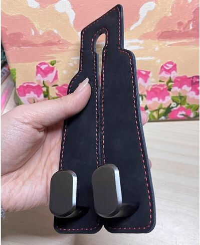 خطافات مسند رأس السيارة الجلدية، خطافات محفظة خلفية لمقعد السيارة 2 في 1 مع شماعات معدنية مزدوجة، حامل تخزين عالمي للسيارة للحقائب وحقائب اليد والهواتف والبقالة (قطعتان، أسود) in Kuwait