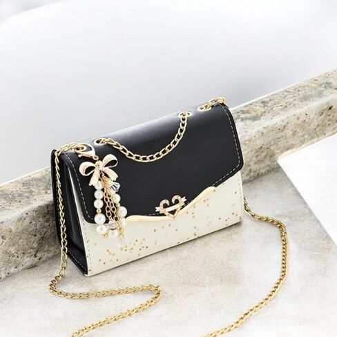 Women's Crossbody Satchel Handbag with Gold Chain Strap, Bow and Pearl Charm decoration. in Saudi Arabia