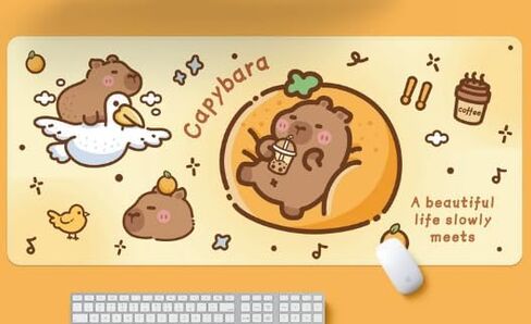 Large Capybara Mouse Pad, 31.5x11.8 Inch Desk Mat, Non-Slip Rubber Base, Comfortable Computer Gaming Mousepad, Cute Animal Themed Office Desk Accessory (Orange Sofa) in Saudi Arabia