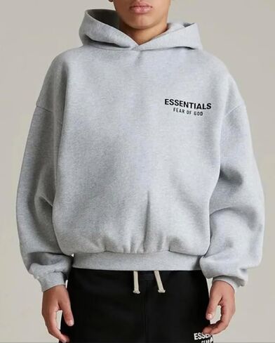 Essentials Oversized Hoodie KIDS (US, Alpha, XX-Large, Regular, FW24 LIGHT HEATHER GREY) in Saudi Arabia