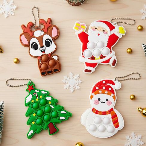 4 Pcs Dinosaur Fidget Toys Set,Kids Toddler Push Bubble Sensory Keychain Squeeze Packs for ADHD Autism Stress Relief Girls Boys Birthday Gift Classroom Favors in Saudi Arabia