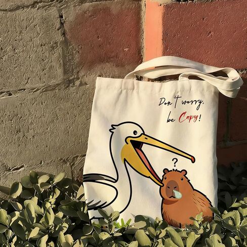 Capybara Canvas Tote Bag, Pelican & Capybara Aesthetics Canvas Tote, Funny Pun, Don't Worry, Be Capy! Double Sided Print Reusable Grocery Bag for Capybara Lovers Gifts, Capy Stuff, 15.8x 13.4 inch in Saudi Arabia