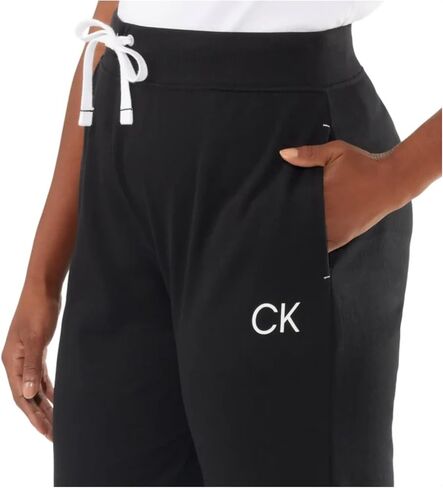 بنطلون نسائي من Calvin Klein مكون من قطعتين من French Terry Jogger مع جيوب in Kuwait