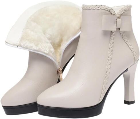 Lady's pointed-toe, thick-soled, bow-shaped ankle boots, made of fashionable leather material. There is a zipper design on the side and the interior is lined with fur for warmth and comfort. in Saudi Arabia