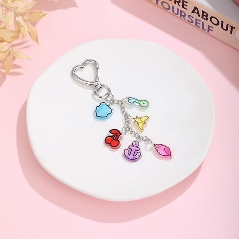 KATSEYE Merch Keychain Soothing Shell Limitless Key Guardian Shield Dual Cherry Stellar Dream Anchor Bag Charm in Saudi Arabia