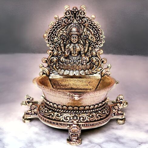 Brass Laxmi Diya Oil Lamp, Antique Gold Finish Traditional Hindu Temple Pooja and Decor, Deepak for Diwali poojan 2.8 x 2 x 3 inches Weight 90 GMS in Saudi Arabia