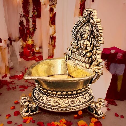 Brass Laxmi Diya Oil Lamp, Antique Gold Finish Traditional Hindu Temple Pooja and Decor, Deepak for Diwali poojan 2.8 x 2 x 3 inches Weight 90 GMS in Saudi Arabia