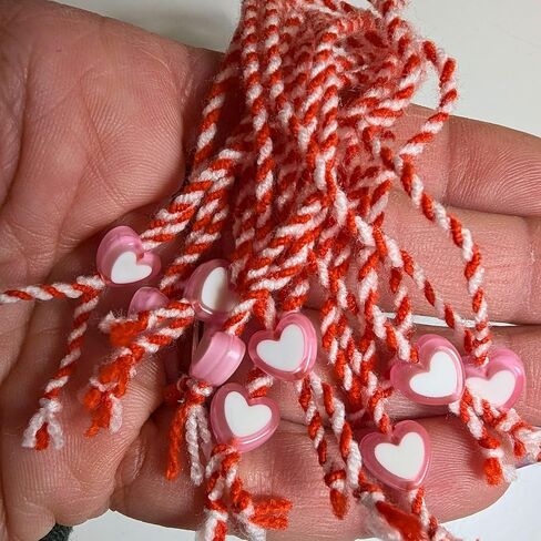 Martenitsa Day Bracelet. Bulgarian Bracelet. Red White Yarn Martenitsi with 1 Pink Heart Bead Each. Happy Baba Marta Gift. Martisor. Tradition in Bulgaria. Tradition in Romania. Set of 10 in Saudi Arabia