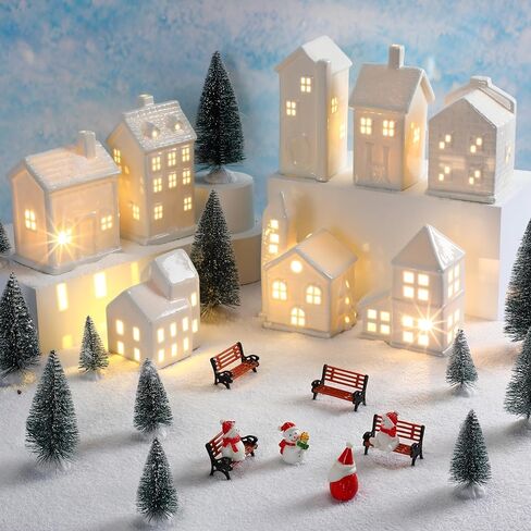 Soaoo 29 Pcs Ceramic Christmas Village Set 8 Led Village Houses 12 Christmas Trees 4 Snowmen 4 Benches and Fake Snow; White Porcelain House Xmas Tabletop Scenes Decoration in Saudi Arabia