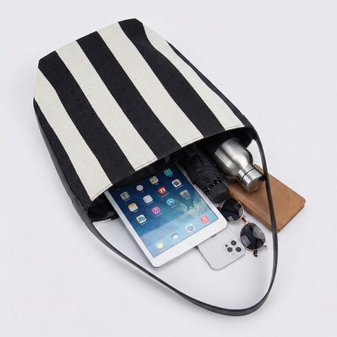 Women's Canvas Bucket Bag Black and White Striped Shoulder Purse Minimalist Hobo Tote Handbag with Vegan Leather Strap for Work Travel and Daily Use in Saudi Arabia