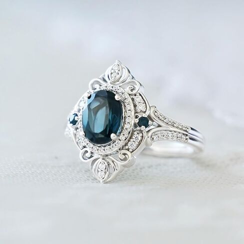 Jewelili Enchanted Disney Fine Jewelry Sterling Silver with 1/5 CTTW Diamond and London Blue Topaz Cinderella Ring Size 8 in Saudi Arabia