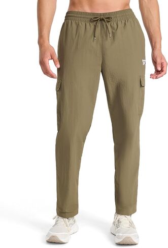 بنطال Ri Utility Woven Cargo للرجال من Reebok، مقاس قياسي، درزة داخلية 31 بوصة، نسيج نايلون خفيف الوزن in Saudi Arabia