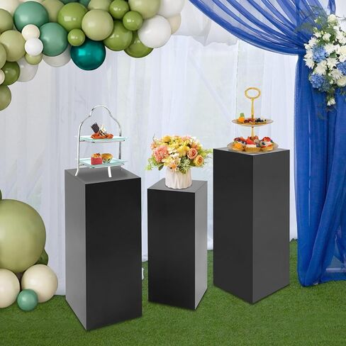 حوامل عرض معدنية سوداء، مجموعة مكونة من 3 قطع بتصميم مكعب حديث، أعمدة عرض قائمة بذاتها للحفلات وحفلات الزفاف والمعارض، ارتفاعات 31.5 بوصة و25.59 بوصة و23.62 بوصة in Kuwait