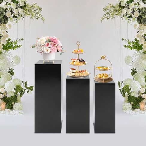 حوامل عرض معدنية سوداء، مجموعة مكونة من 3 قطع بتصميم مكعب حديث، أعمدة عرض قائمة بذاتها للحفلات وحفلات الزفاف والمعارض، ارتفاعات 31.5 بوصة و25.59 بوصة و23.62 بوصة in Kuwait