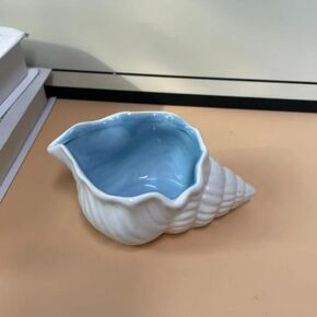 A marine style series of ceramic jewelry storage ornaments, suitable for storing watches, jewelry and keys, as an exquisite decorative item. (Pearl-colored conch shell) in Saudi Arabia