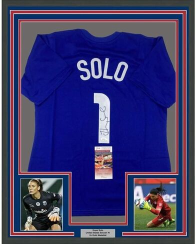 Framed Autographed/Signed Hope Solo 33x42 United States USA Blue Soccer Jersey JSA COA in Saudi Arabia