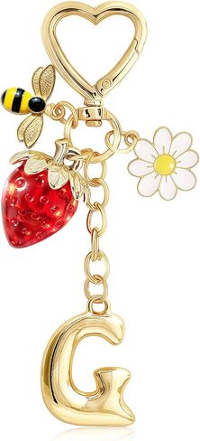 سلسلة مفاتيح بالحرف الأول من الفقاعة الذهبية مع حلية زهرة الأقحوان على شكل نحلة الفراولة in Kuwait