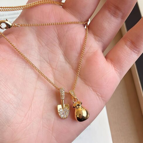 18K Plated Gold Shovel and Money Bag Charm Necklace with Crystal Accents in Saudi Arabia