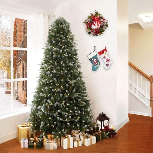 Alberta 4.5ft Frosted Prelit Artificial Christmas Tree with 679 Branch Tips, 200 Warm Lights and Metal Stand, 36" Wide Realistic Lightly Snow Flocked Christmas Tree with Lights by Naomi Home in Saudi Arabia