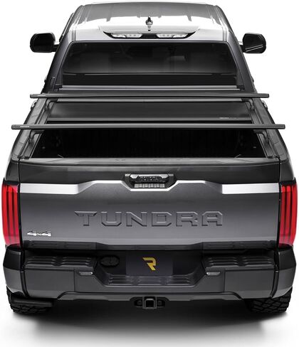 غطاء تونيو لسرير الشاحنة القابل للسحب من RealTruck Roll-N-Lock E-Series XT | 131E-XT | يناسب 2021 - 2025 Ford F-150 مقاس 5 أقدام و7 بوصات (67.1 بوصة) in Kuwait